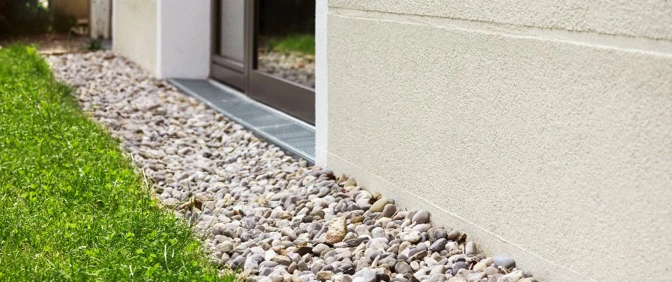 French drain against a house in Flower Mound, TX.