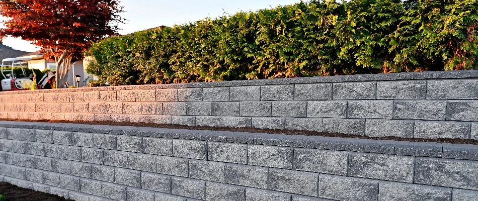 Retaining wall in Flower Mound, TX, with a raised planter bed.